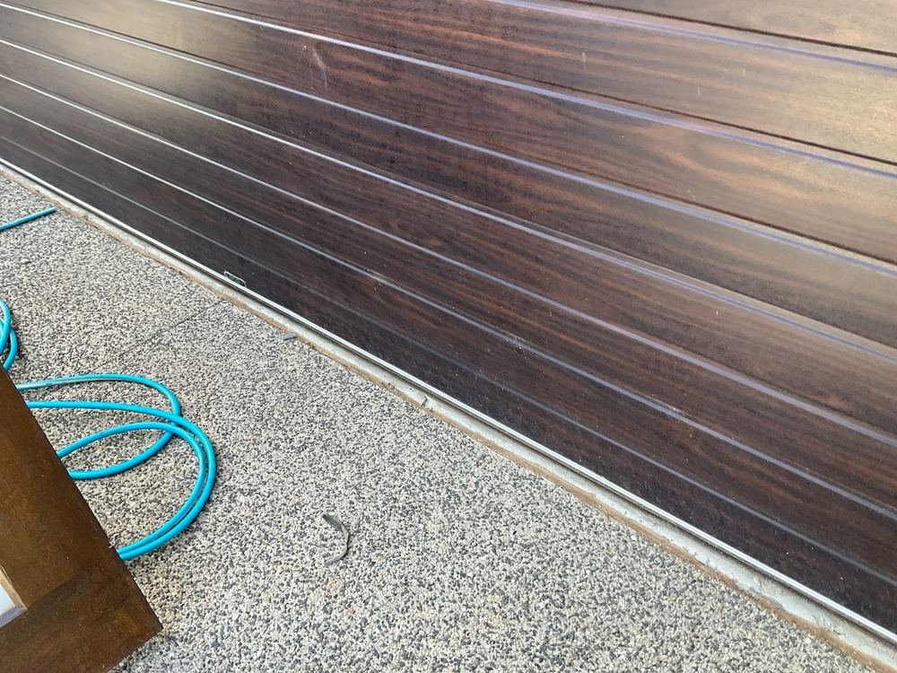 Chipped and damaged concrete floor at handover, found during a pre-handover inspection in Tarneit